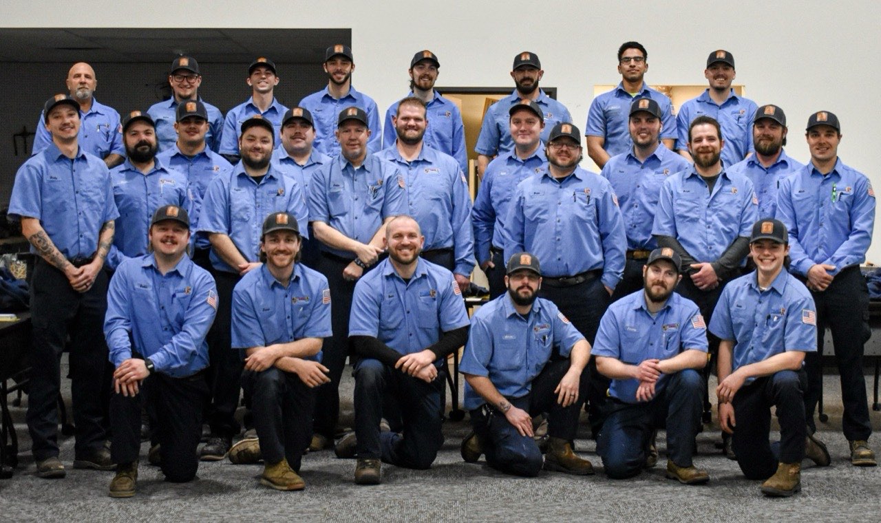 Valley Plumbing's licensed in-house technicians in branded uniforms