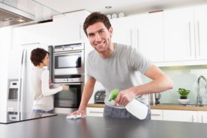 Man cleaning his kitchen. Kitchen Remodeling