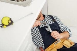 a plumber working