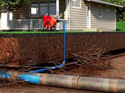 Showing pipe relining trenchless technique under a resident's lawn